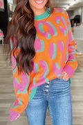 Women’s round-neck colorblock leopard print sweater in orange, pink, and teal