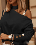 Black one-shoulder sweater with round buttons on cuffs and layered neckline
