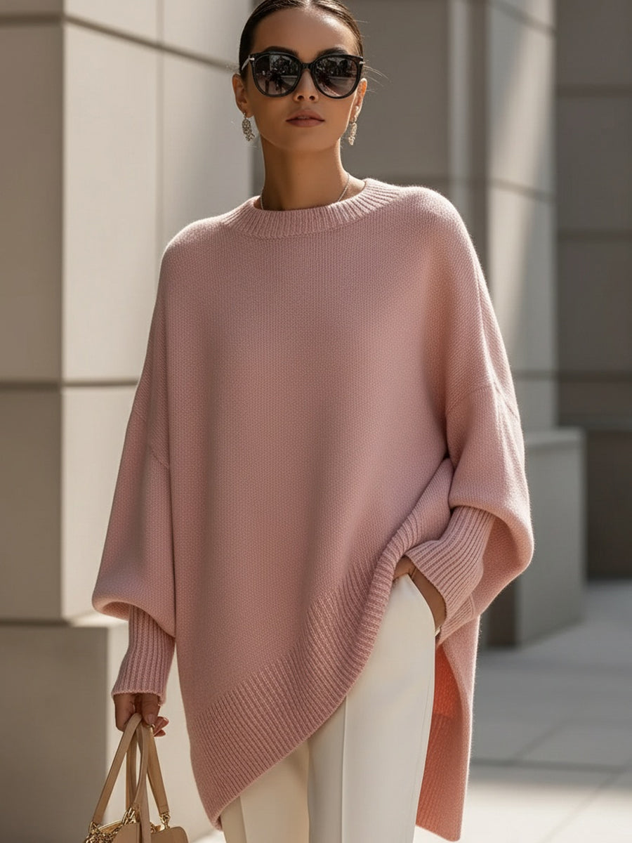 Oversized poncho sweater with ribbed crew neckline, soft pink