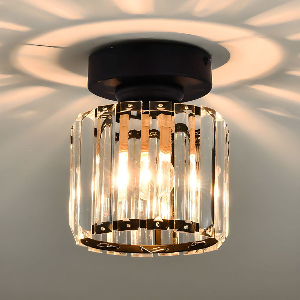 Black crystal flush mount ceiling lamp with clear prism panels and warm bulbs