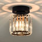 Black crystal flush mount ceiling lamp with clear prism panels and warm bulbs