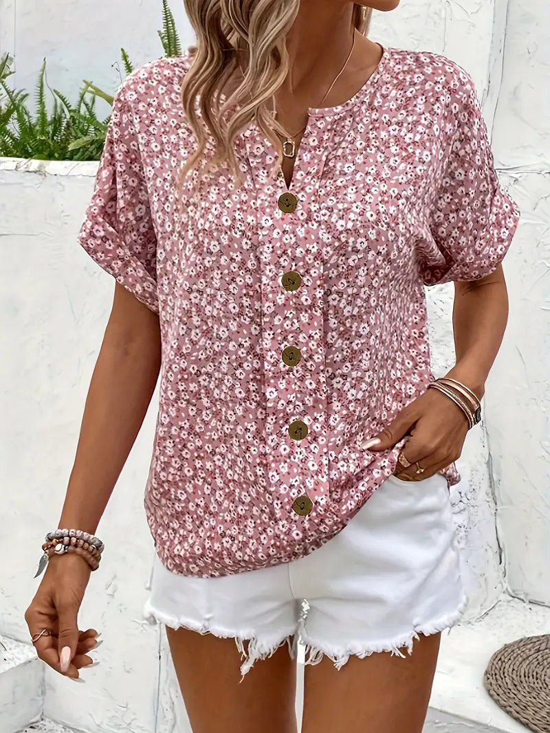 Pink floral short-sleeve button-up blouse with front button placket