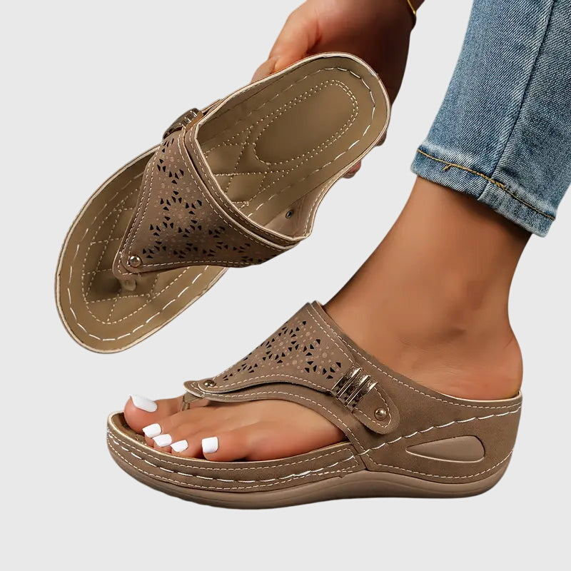Women's wedge sandals in tan, perforated slide with adjustable buckle strap