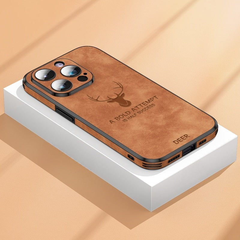 Deer leather iPhone case in brown with camera cutouts, deer emblem, and port openings.
