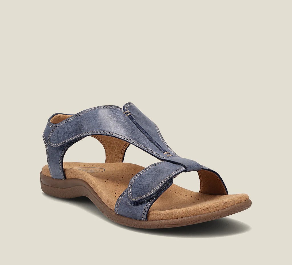 Blue comfort sandals with adjustable cross strap and cushioned footbed