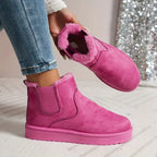 Pink suede low-cut slip-on boots with side elastic gore and faux-fur lining