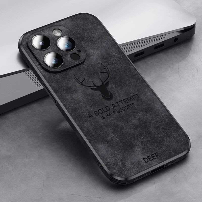 Deer leather iPhone case in dark gray/black with camera cutouts and deer emblem.