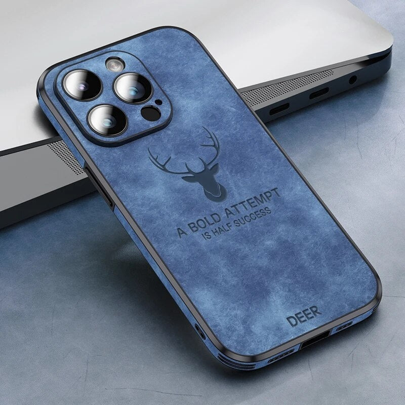 Deer leather iPhone case in blue with camera cutouts, deer emblem, and rugged border.