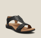 Black comfort sandals with adjustable cross strap and cushioned footbed
