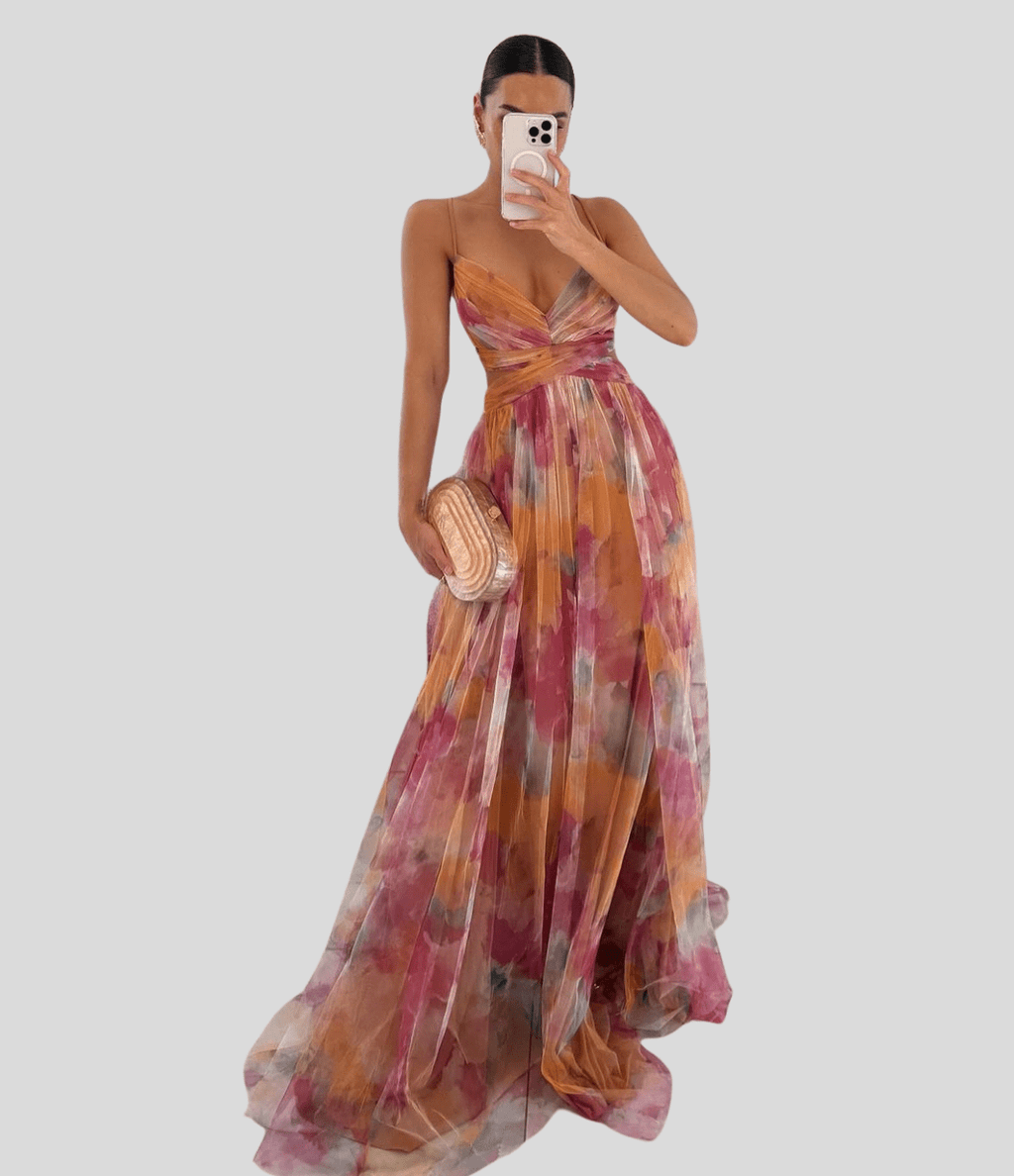 Floral maxi dress with ruffled straps and square neckline, orange-yellow and pink floral print.
