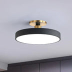 Round flush-mount LED ceiling lamp, black shade with gold mounting base and white light