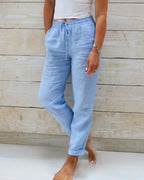 Light blue relaxed drawstring casual pants with pockets and elastic cuffs