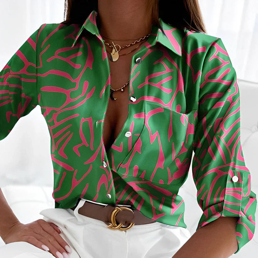 Green abstract print button-up blouse with pink pattern, pointed collar, long sleeves