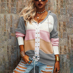 Striped women's sweater in gray and cream with white lace-up front placket.