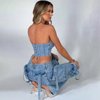 Light blue high-waist cargo jeans, relaxed fit with flap and drawstring utility pockets.