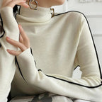 Light cream turtleneck sweater with long sleeves and contrast trim