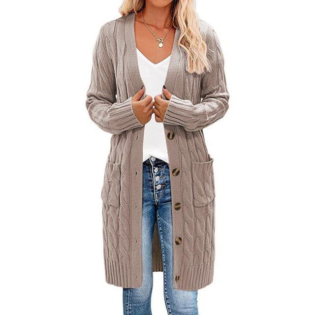 Gray long knitted vest with button-front and cable texture side pockets.