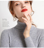 Gray ribbed turtleneck sweater with high collar and fitted long sleeves
