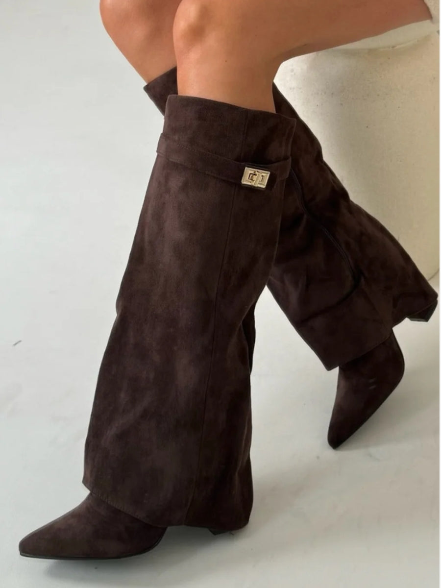 Brown knee-high suede boots with wide flare top, block heel, square buckle cuff