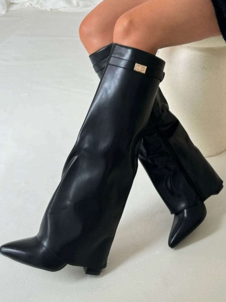 Black knee-high boots with wide flare top, block heel, side zip and square buckle