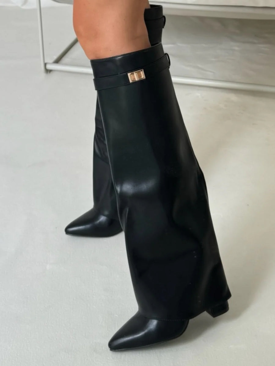 Black knee-high boots with wide flare top, block heel, buckle strap at cuff