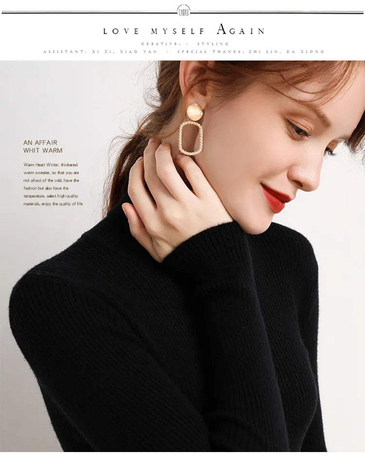 Black ribbed turtleneck sweater with high collar and long sleeves