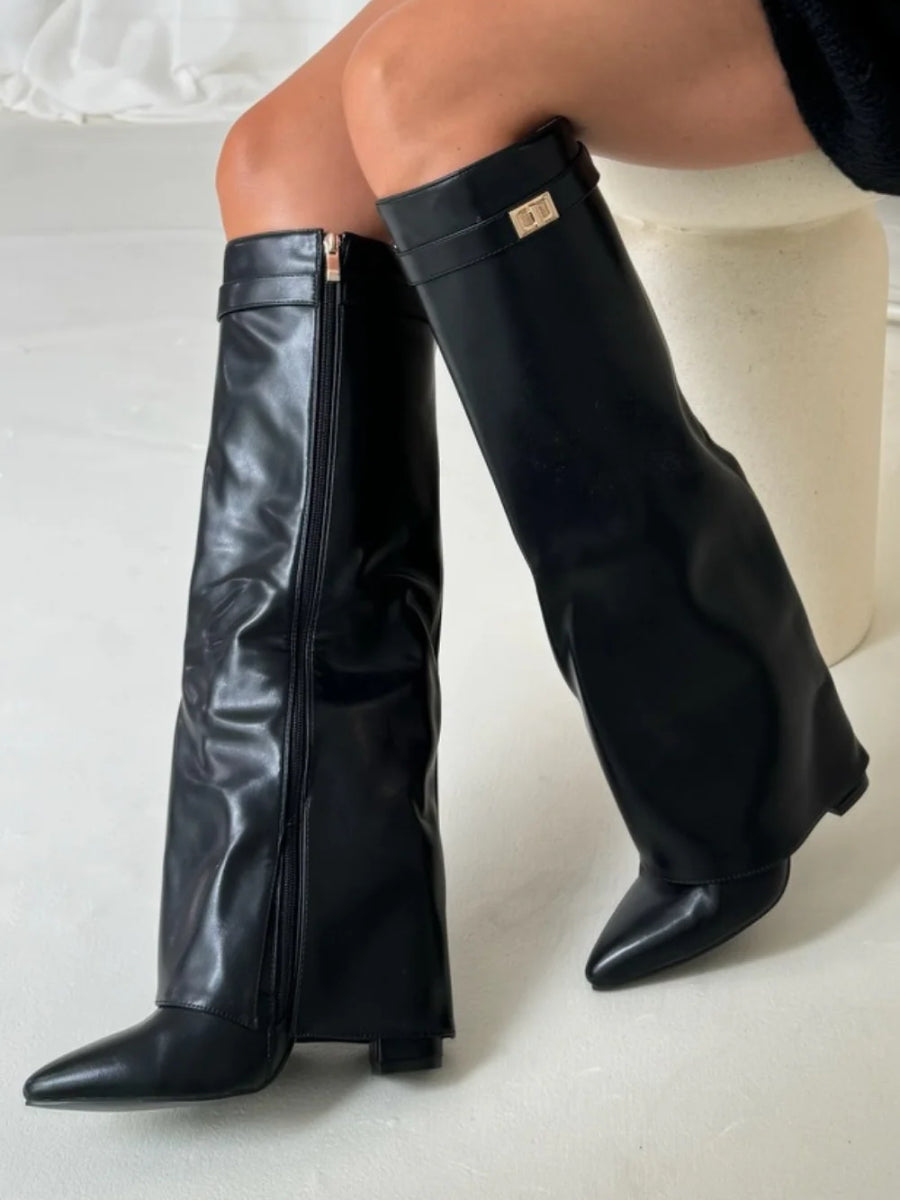 Black knee-high boots with wide flare top, block heel, side zip and buckle detail