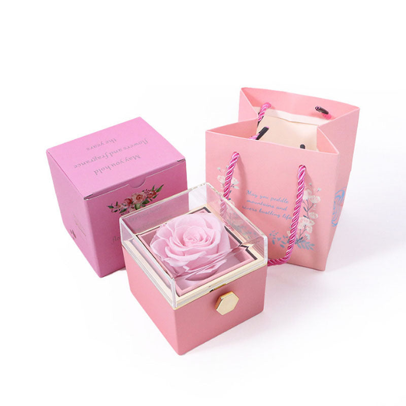 Pink jewelry gift box set with pink artificial rose in clear square holder