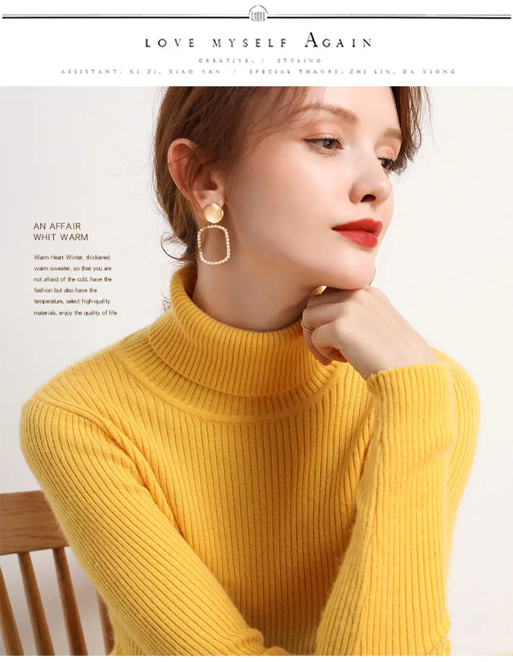 Mustard yellow ribbed turtleneck sweater with long sleeves and a high collar.