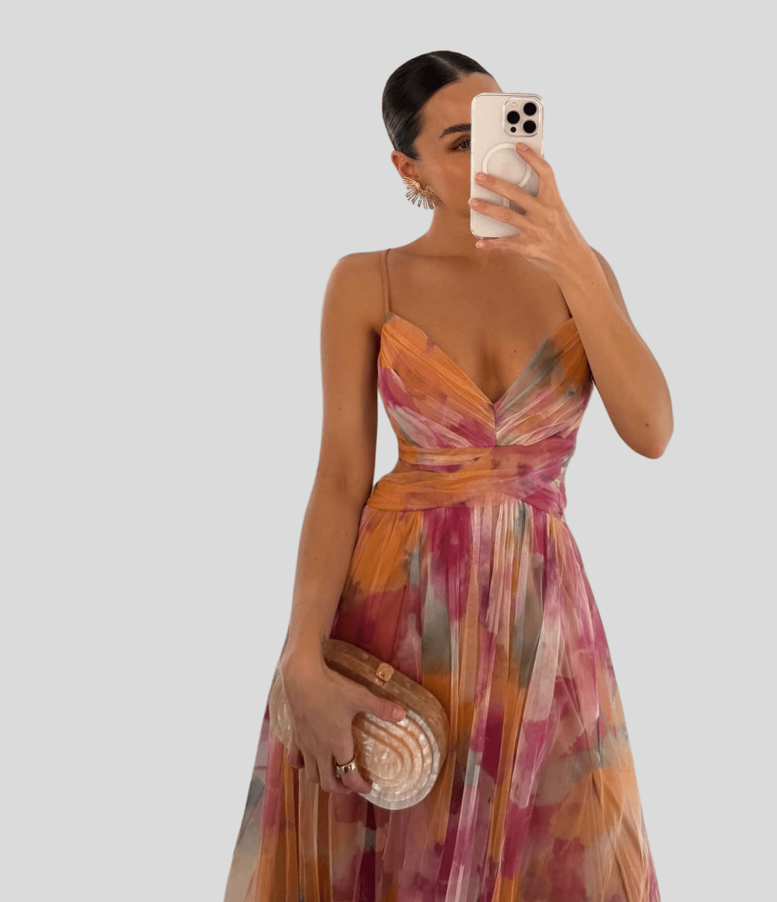 Floral maxi dress with ruffled straps, square neckline, orange-pink abstract print.