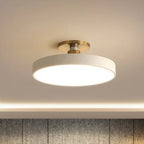 Round flush-mount LED ceiling lamp, white shade with gold base and bright glow