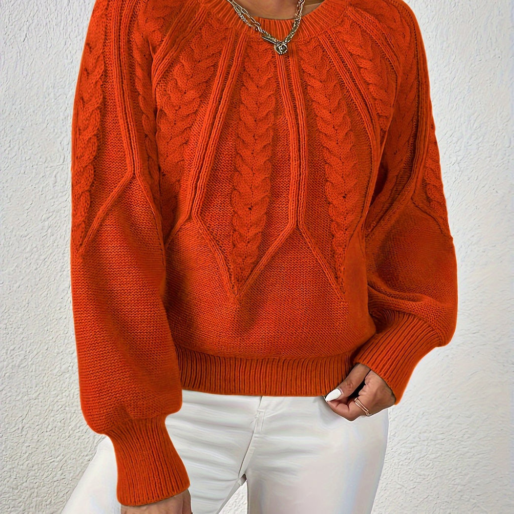 Women’s cable knit sweater with lantern sleeves, orange, raised cable knit yoke detail.