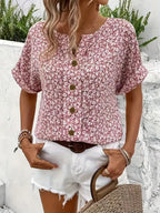 Pink floral short-sleeve button-up blouse, front view, round neckline