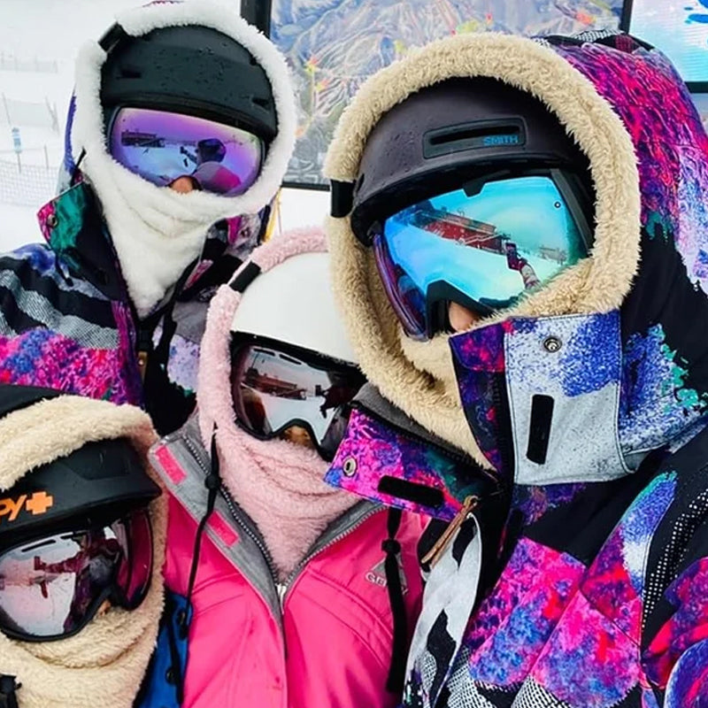 Beige fleece balaclava hood with face cover, worn under a winter helmet