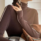 Brown turtleneck sweater with long sleeves and white contrast trim