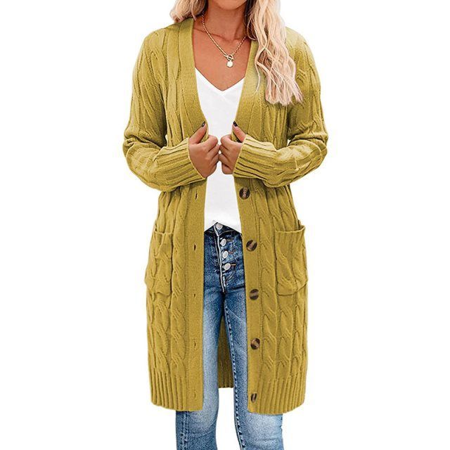 Mustard yellow long knitted vest with button-front and cable texture side pockets.