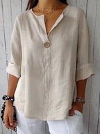 Ivory cotton loose-fit blouse, 3/4 sleeves, single-button V-neck placket