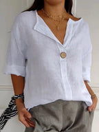 White cotton loose-fit blouse, 3/4 sleeves, single-button V-neck placket