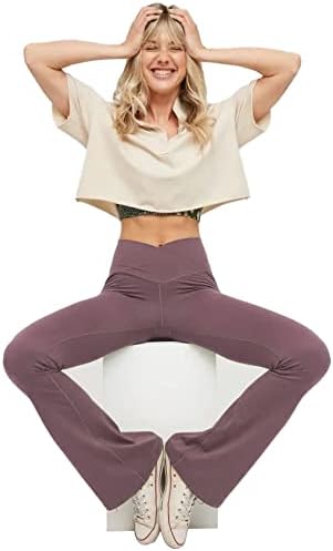Women’s high-waisted flared yoga leggings in mauve, model wearing yoga pose