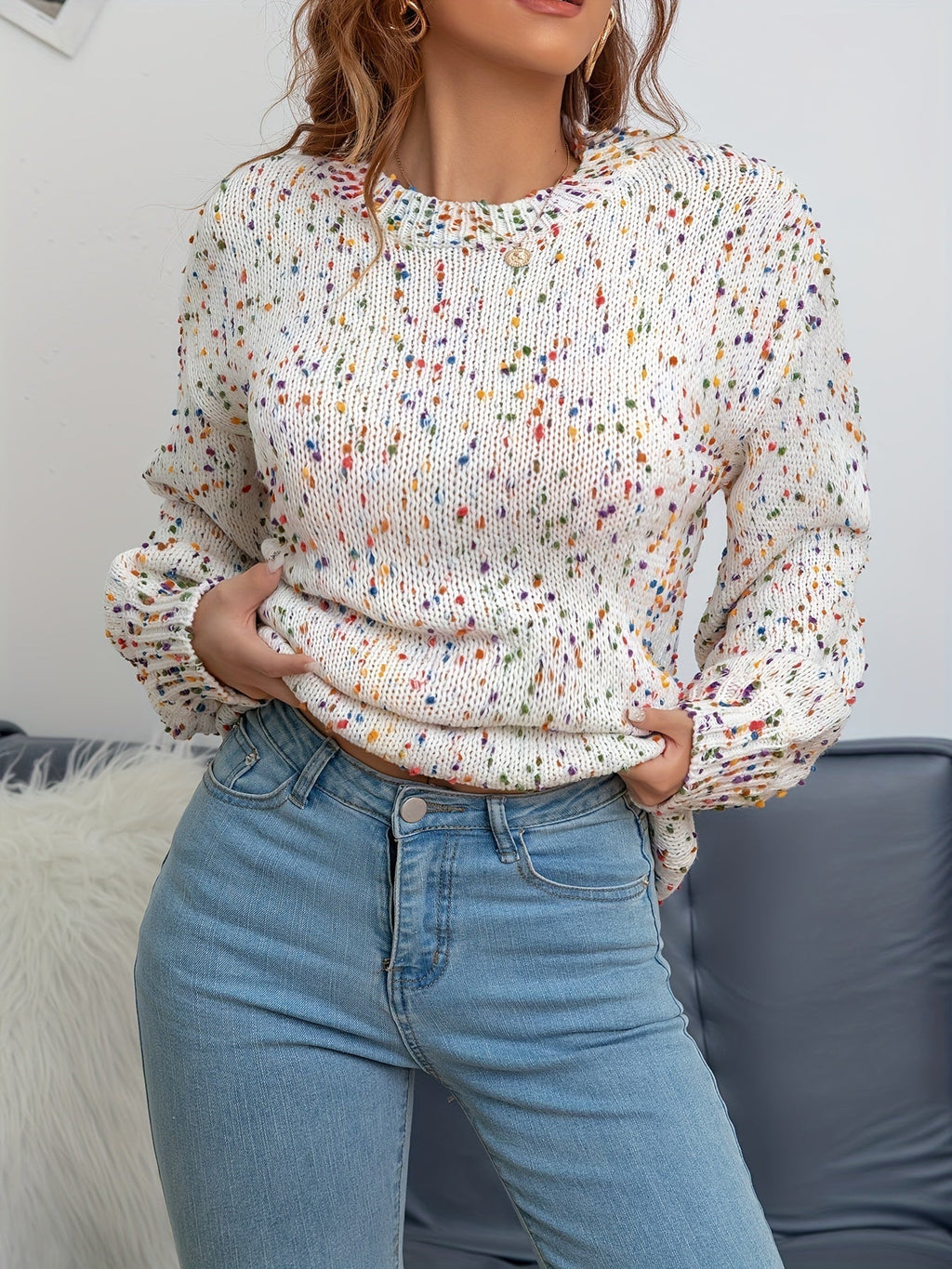 Women’s confetti knit sweater with long sleeves and crew neckline, ribbed cuffs