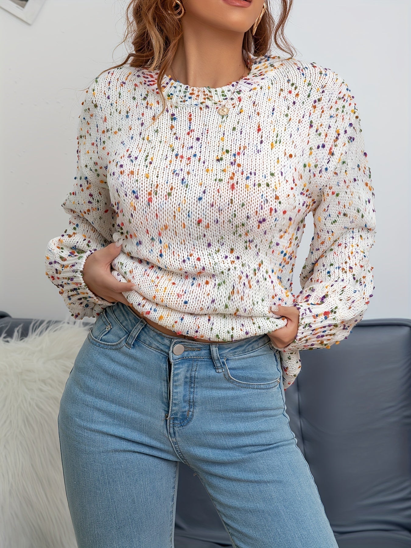 Women’s confetti knit sweater with long sleeves and crew neckline, ribbed cuffs