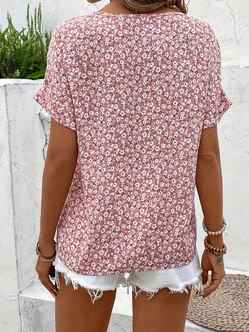 Pink floral short-sleeve button-up blouse, back view, gathered yoke seams