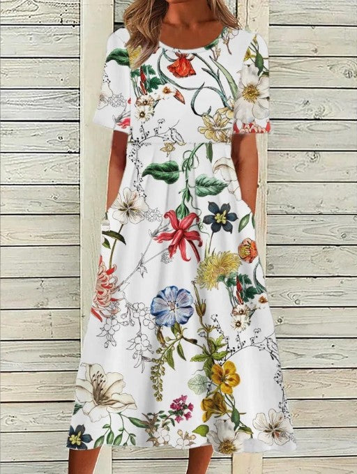 White floral midi dress with short sleeves and gathered skirt, scoop neckline
