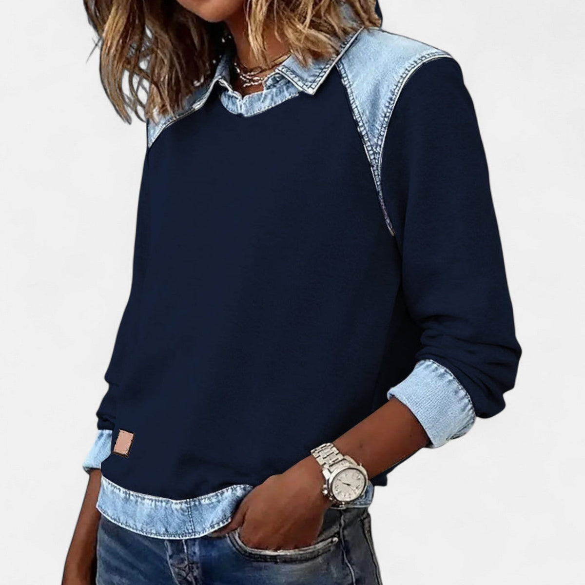 Women's navy sweater with denim-look layered collar and long sleeves