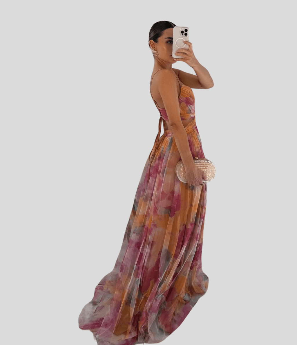 Floral maxi dress with ruffled straps, square neckline, multicolor abstract floral pattern.