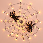 Halloween LED spiderweb lights with warm bulbs and black spider ornaments