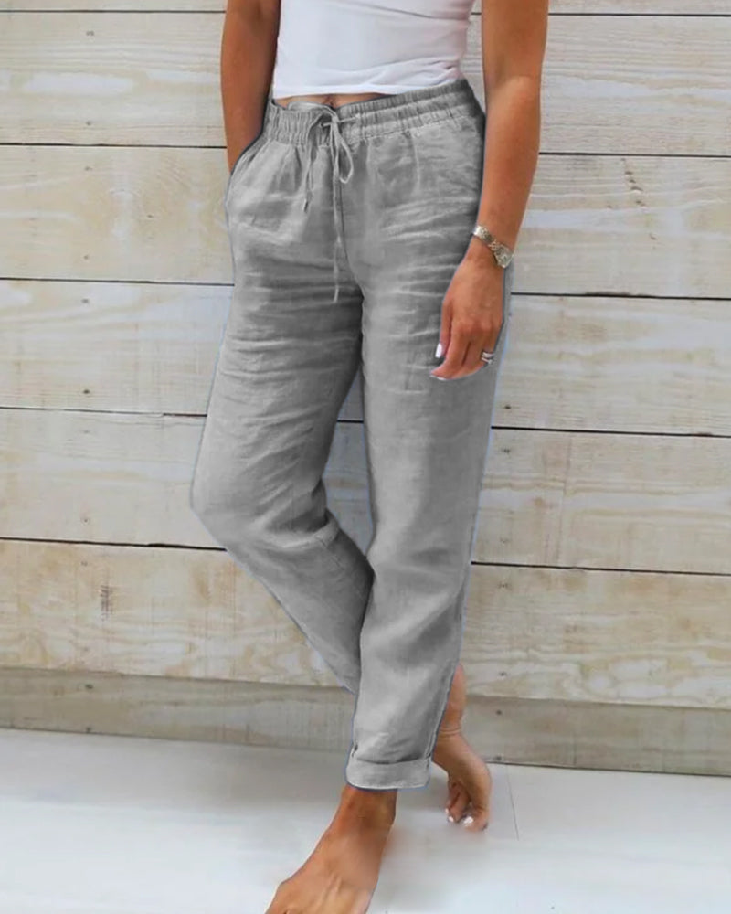 Gray relaxed drawstring casual pants with pockets and ankle cuffs