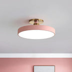 Round flush-mount LED ceiling lamp, pink shade with gold base and white light