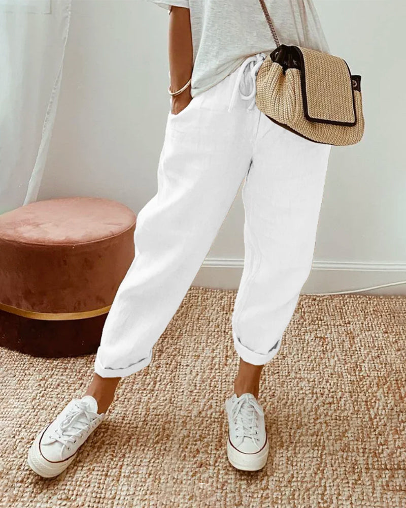 Women’s anti-sweat pants in white, cuffed ankle, drawstring waistband