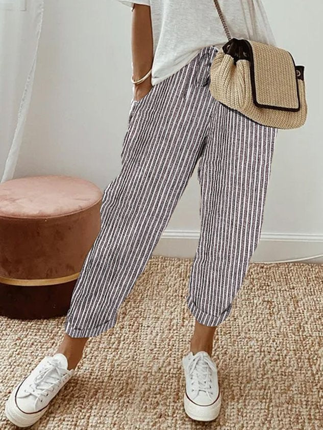 Women’s anti-sweat pants in grey pinstripe, cuffed ankle, drawstring waistband